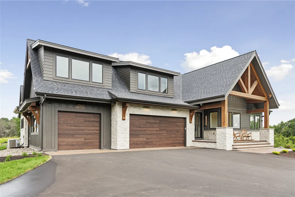 Luxury suburban home with garage and driveway