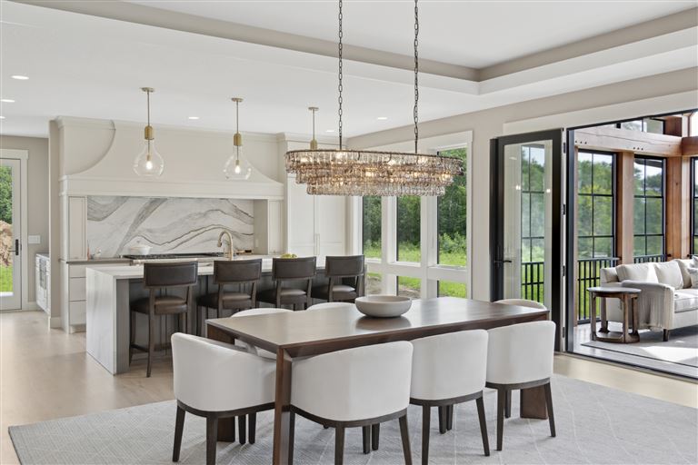 Luxurious contemporary dining room with minimalist design and modern furniture.