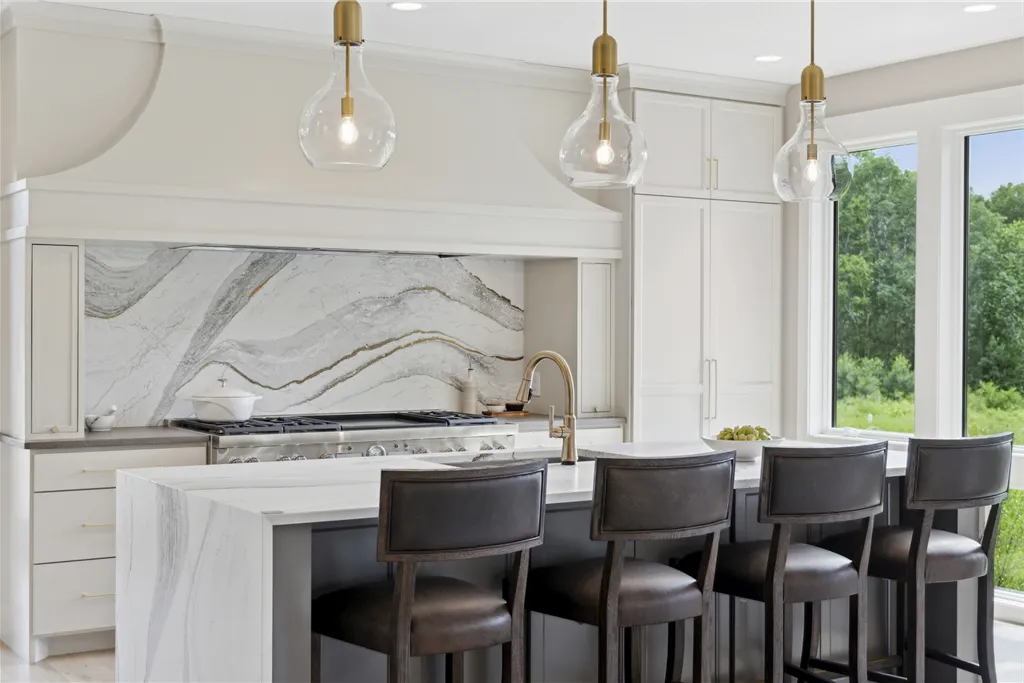 Luxurious contemporary dining room with elegant furniture and large windows.