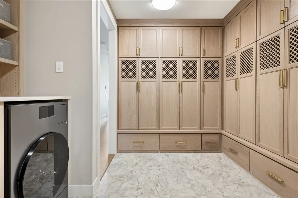 Luxurious contemporary interior with wooden cabinetry in a family home.