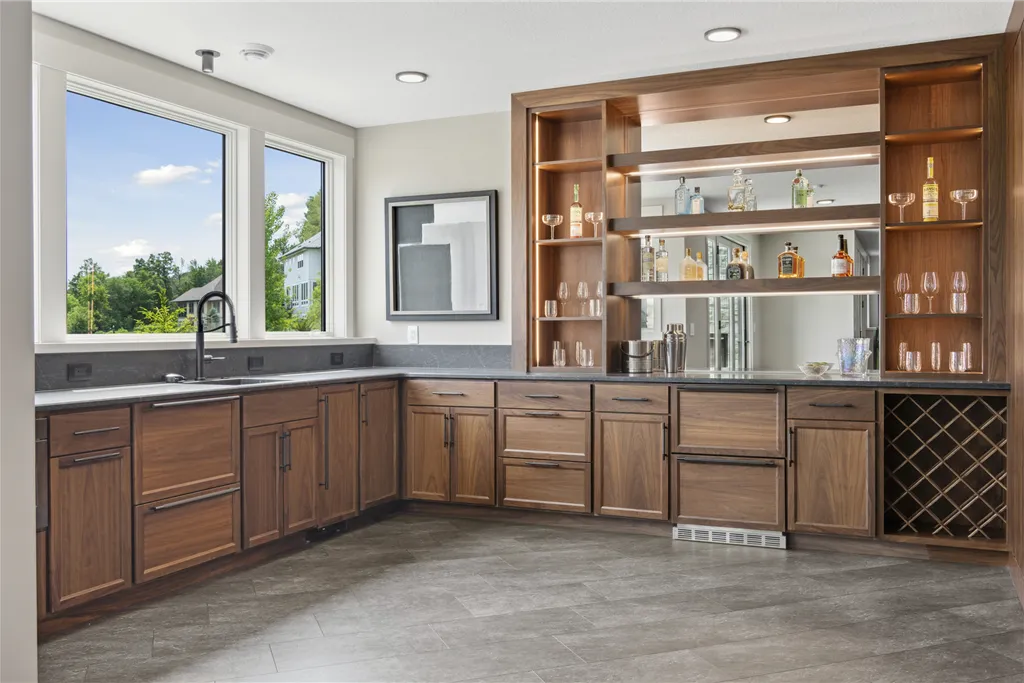 Contemporary luxury kitchen with modern furniture and appliances.