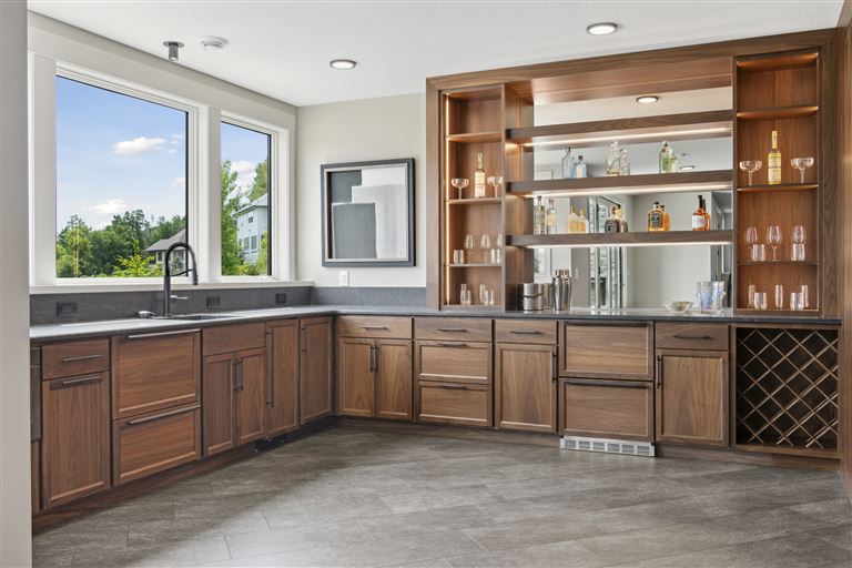 Contemporary luxury kitchen with modern furniture and appliances.