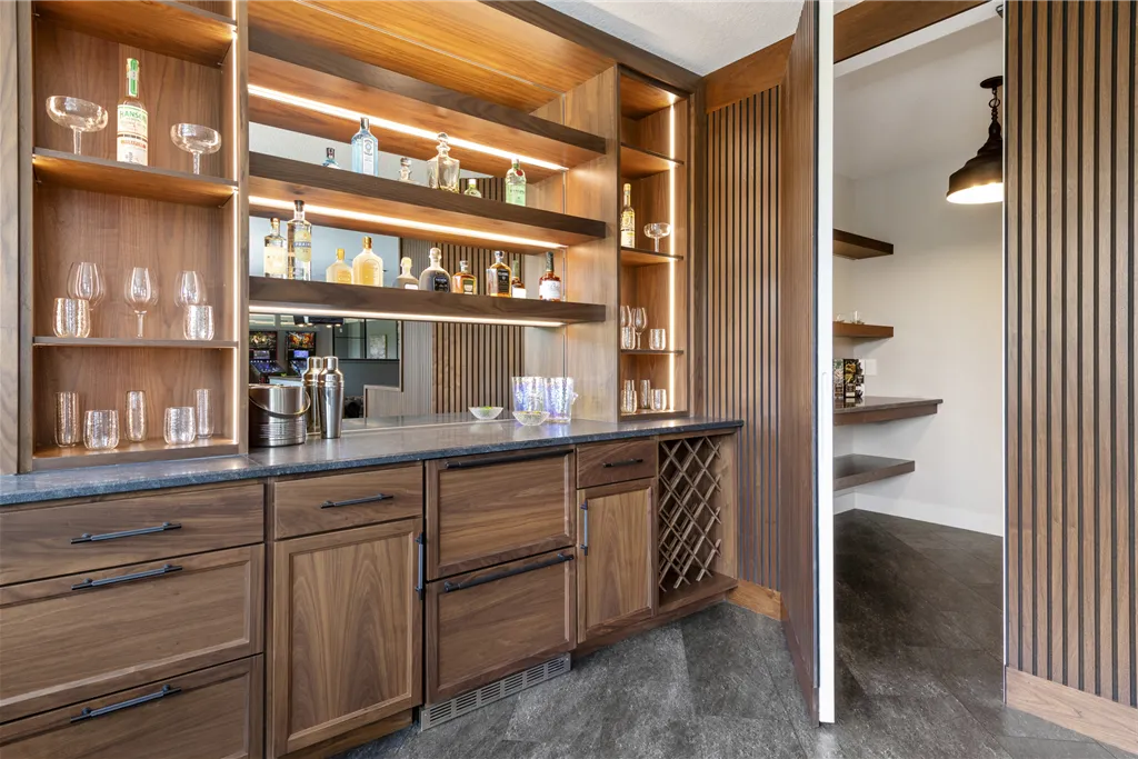 Contemporary luxury interior with wooden shelving and cabinetry.