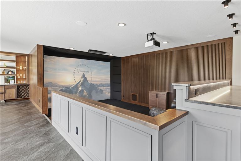 Contemporary minimalist interior design in a luxury home with modern furniture and wooden cabinets.