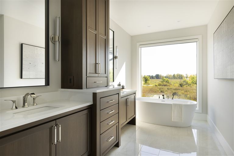 Contemporary luxury bathroom with bathtub and modern design.