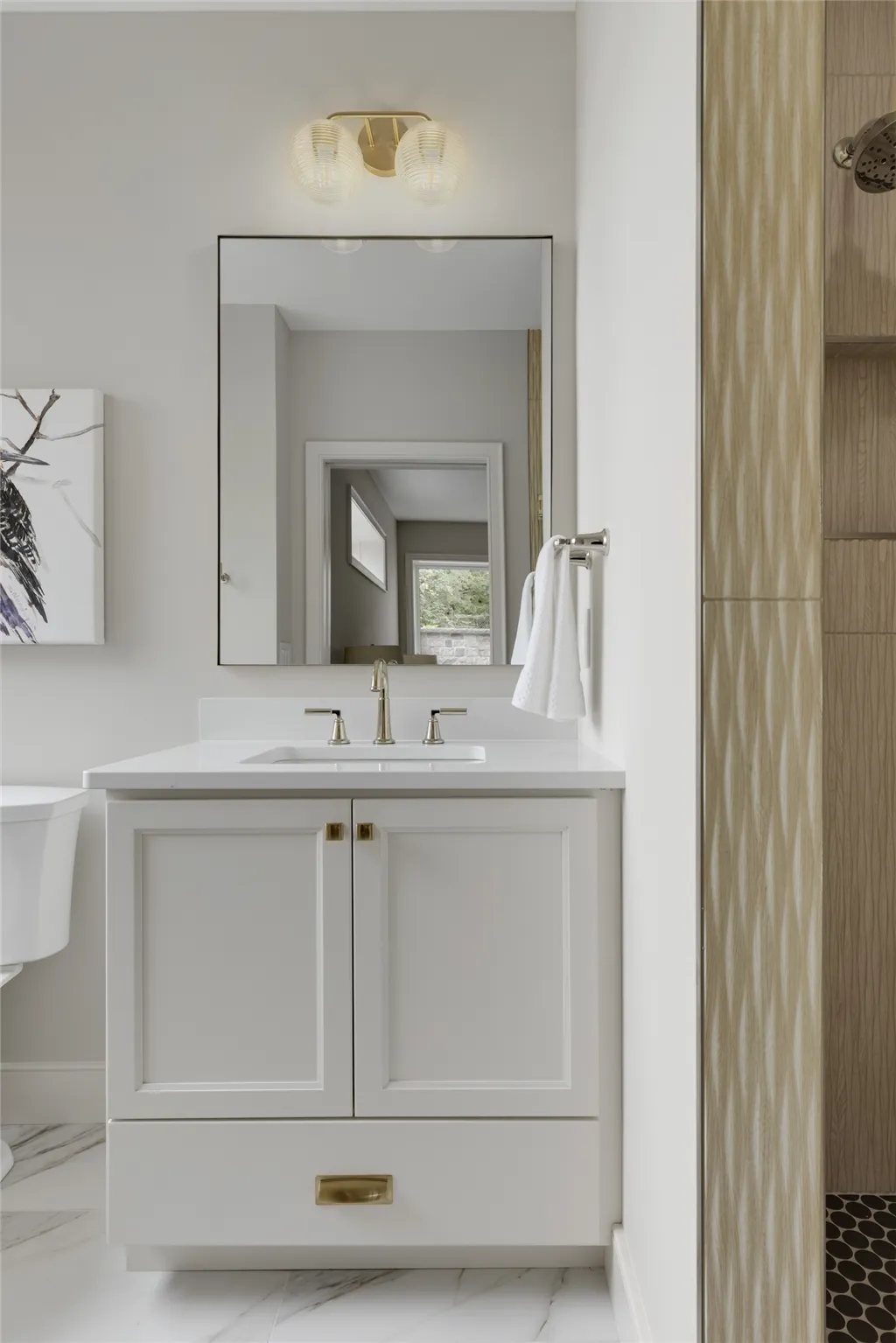 Contemporary minimalist interior design with luxury elements by Hartman Homes.