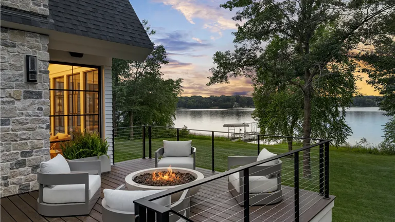 Luxury lakefront house with garden and patio by Hartman Homes in Stillwater, MN.