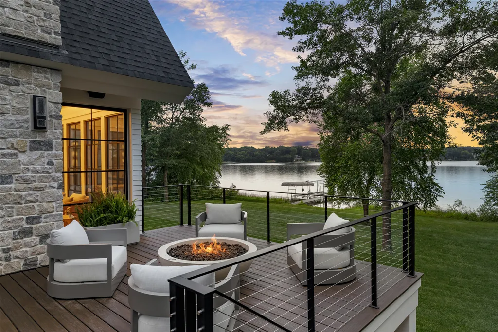 Luxury lakefront house with garden and patio by Hartman Homes in Stillwater, MN.