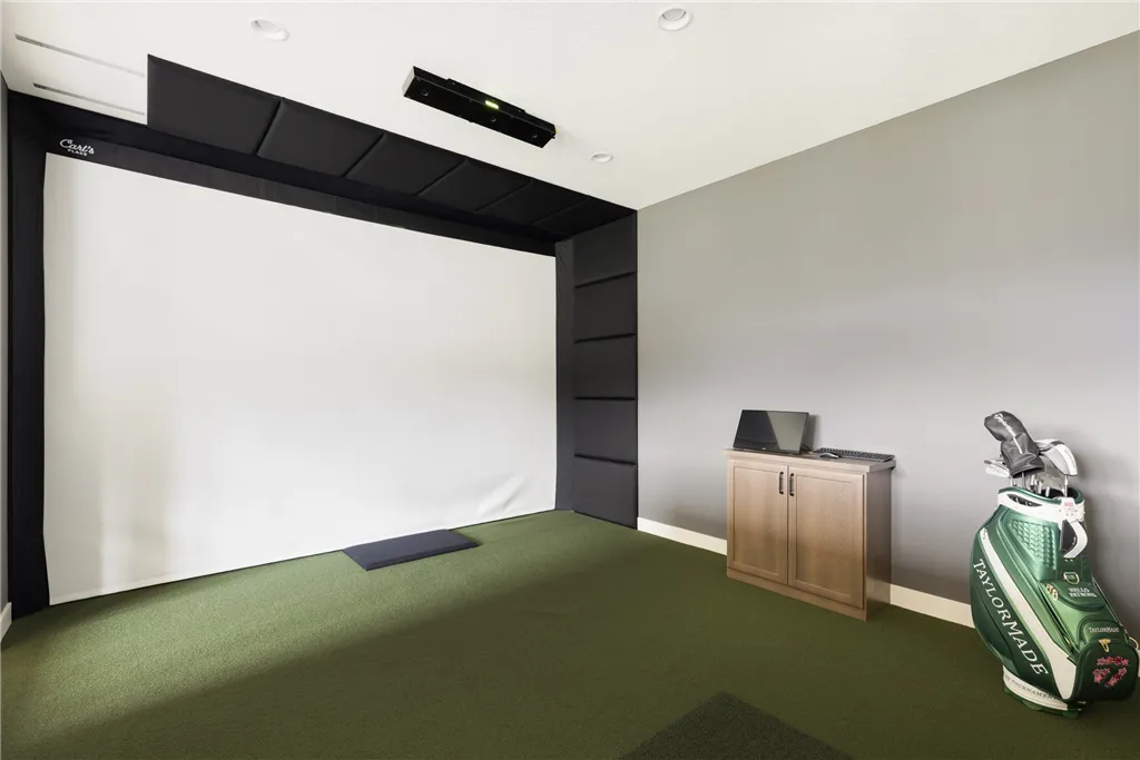 Luxurious minimalist family room with contemporary furniture and broad parquet flooring.