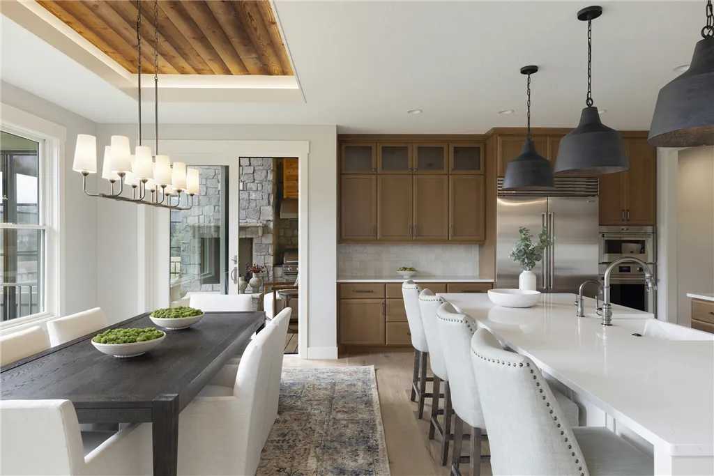 Interior view of a luxury contemporary dining room with a minimalist design.