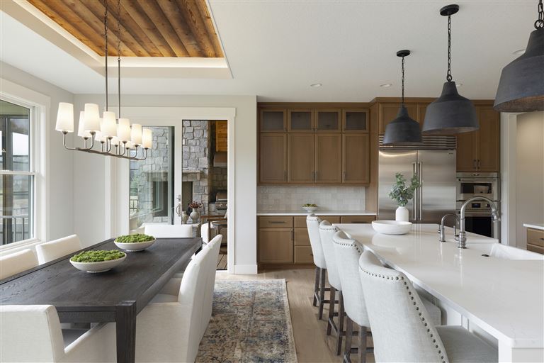 Interior view of a luxury contemporary dining room with a minimalist design.