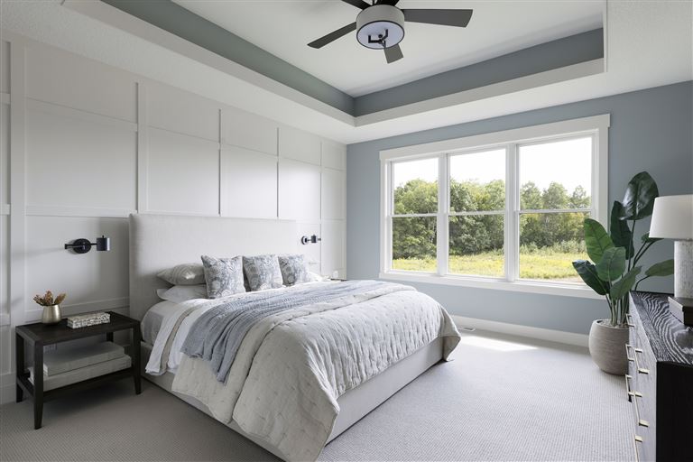 Contemporary family bedroom with minimalist design and luxury furnishings.