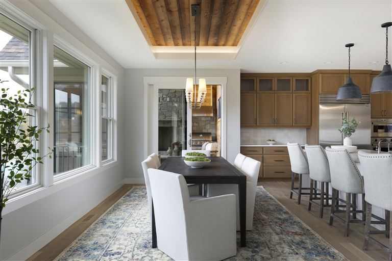 Contemporary dining room with modern furniture and large window