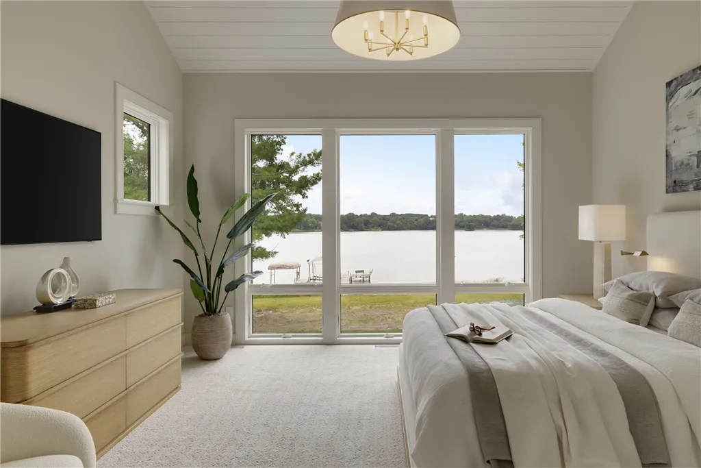 Luxurious minimalist bedroom with contemporary furniture and large window.