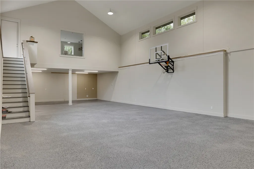 Minimalist interior design of a modern home with empty space and sleek architecture.