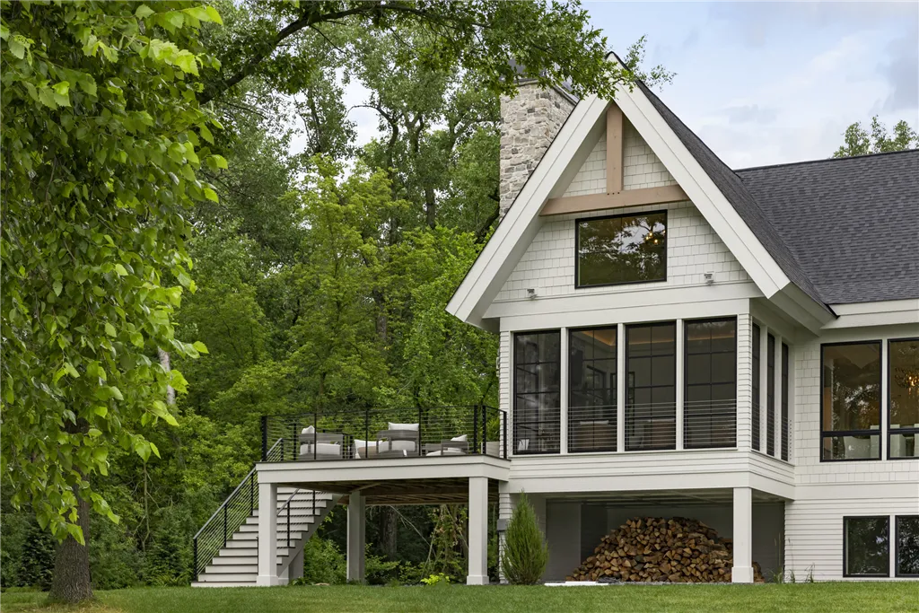 Upscale suburban home with a spacious yard and modern architecture.