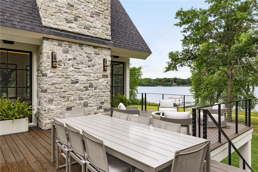 Luxurious contemporary home with a spacious patio and modern architecture.