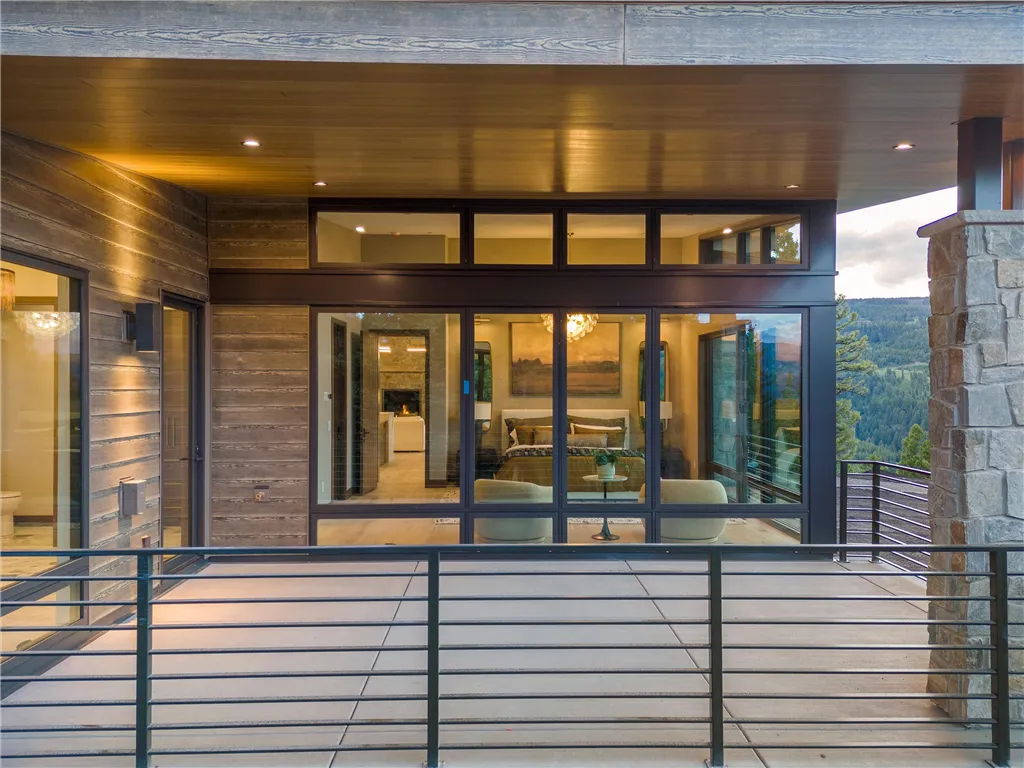 Entrance of a modern urban building with glass windows and doors.