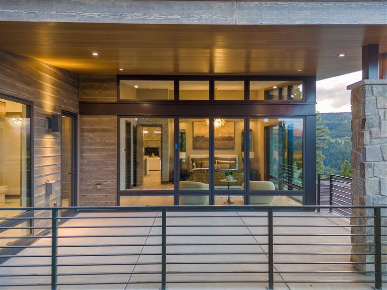 Entrance of a modern urban building with glass windows and doors.