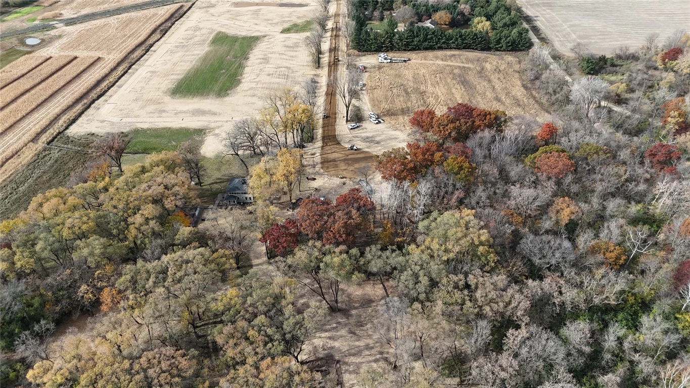 Aerial view of Oaks of St. Croix with trees, mountains, and a house.