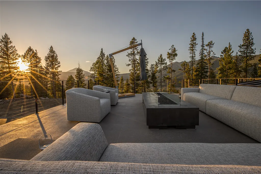Modern architecture in a snowy winter landscape at sunset